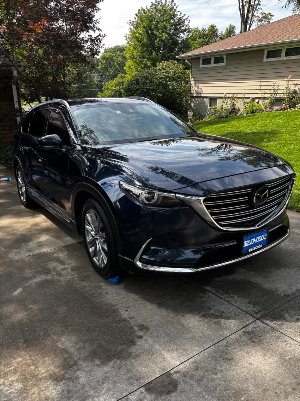 Detailed dark Mazda CX-9 with glossy finish